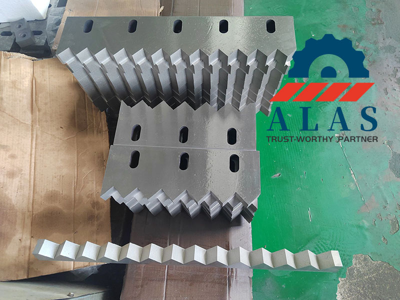 ALAS Heavy-Duty Industrial Shredder Stator Comb Blades Close-up view of precision-machined heavy-duty shredder counter blades and comb stator knives by ALAS