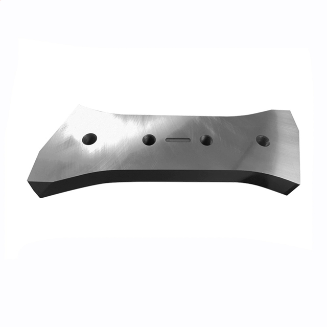 High-impact scrap shear blades for industrial metal recycling processing.