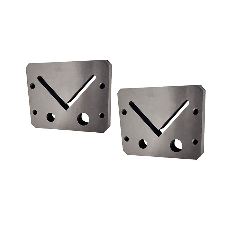Close-up of V-shaped ironworker angle shear blades for precise metal cutting