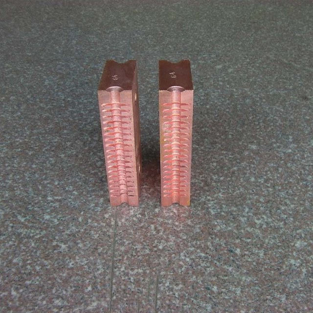 Concrete pile machine rebar clamp