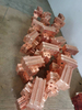 Concrete pile machine reinforcement clamp