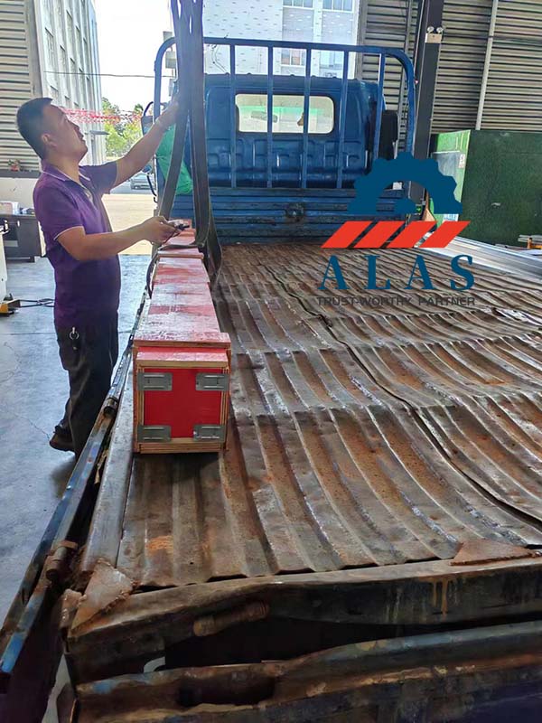 ALAS long press brake lower dies inside secure export wooden crate on truck