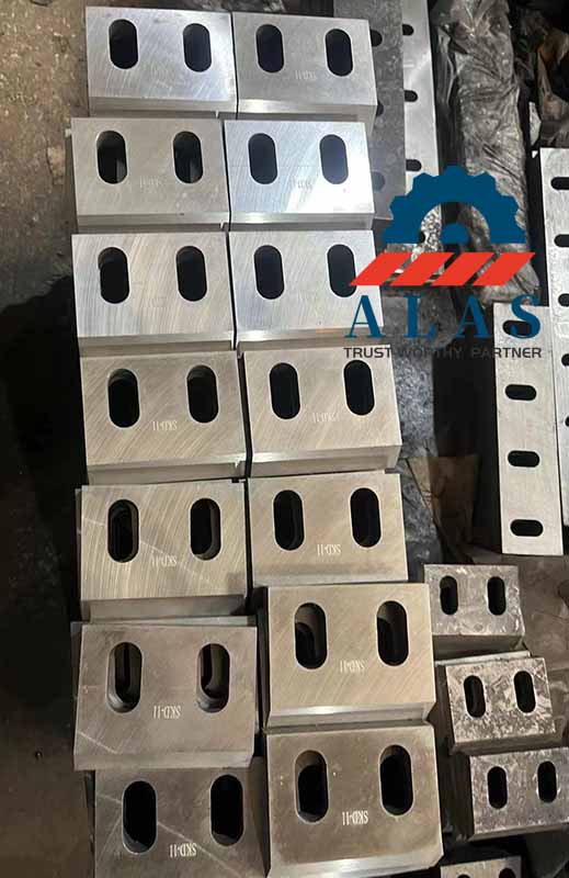 Precision CNC ground plastic grinder blade replacements ready for packaging