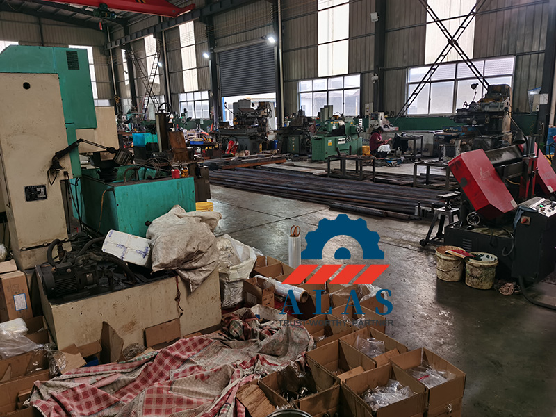 Heavy-duty metal processing machinery and tooling equipment inside Alas production facility