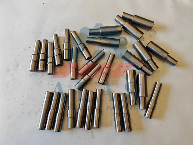 Bulk collection of custom stepped bending pins precision machined for heavy duty rebar machinery
