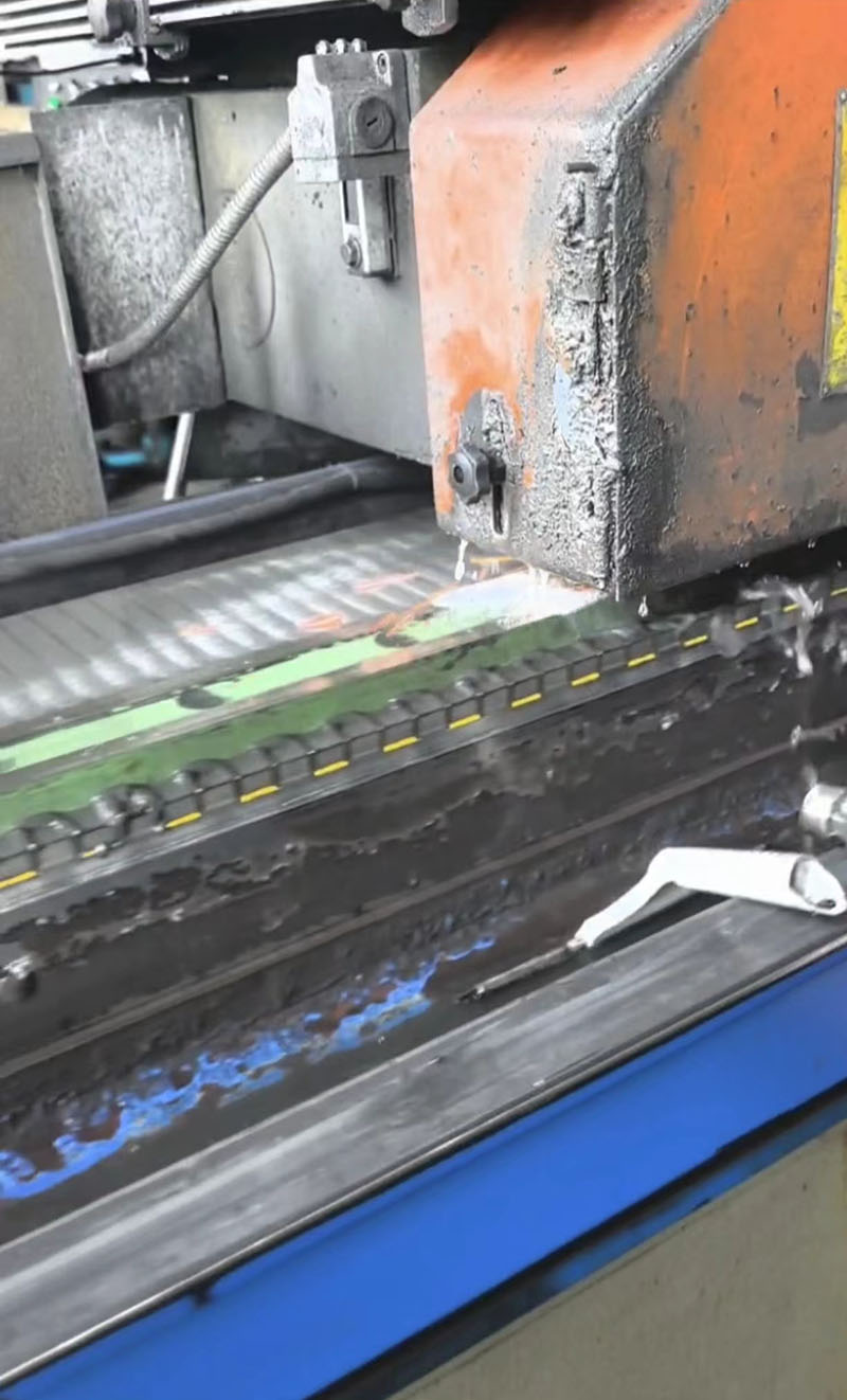 High-precision surface grinding process for custom shearing machine blades to ensure parallelism.