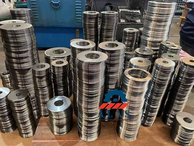 Massive direct factory wholesale inventory of precision-ground circular packaging slitter knives ready for shipping.
