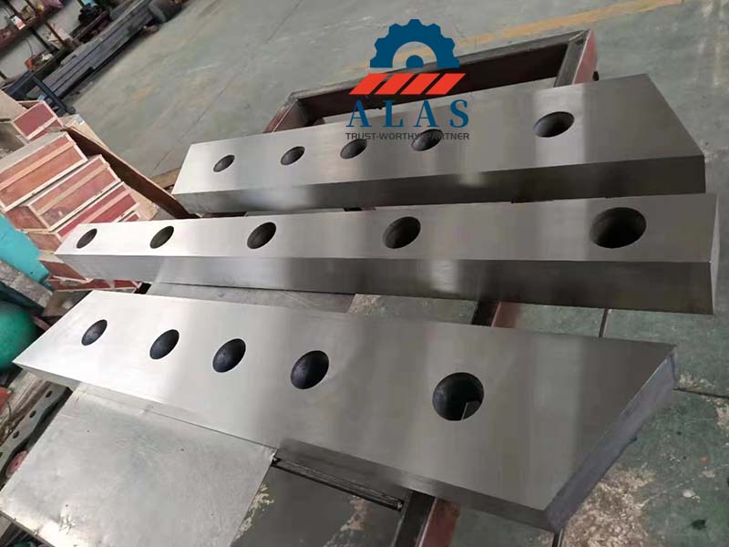 Heavy-duty gantry scrap shear blades with custom acute relief angles and deep-pocket profiling bevels
