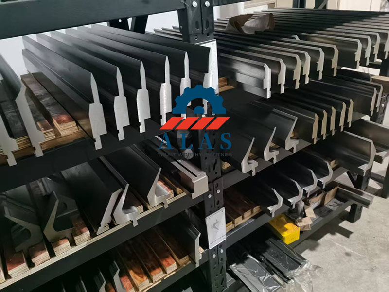 Segmented press brake upper punches stored on racks, highlighting standard shanks compatible with global machinery
