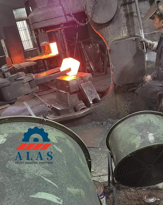 Heavy-duty steel forging process using large forging press for industrial shredder blades at Alas factory