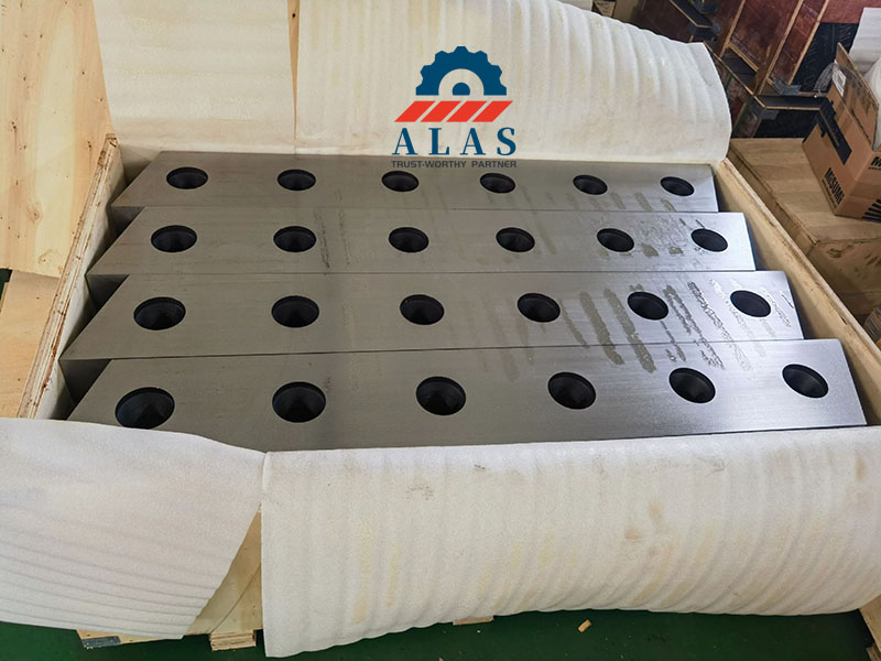 Heavy duty scrap metal shear blades padded with protective shock-proof film layers inside export wooden case