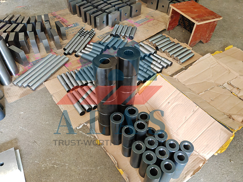 Bulk production inventory of rebar bender pin shafts, sleeves, and rollers at ALAS warehouse ready for wholesale delivery