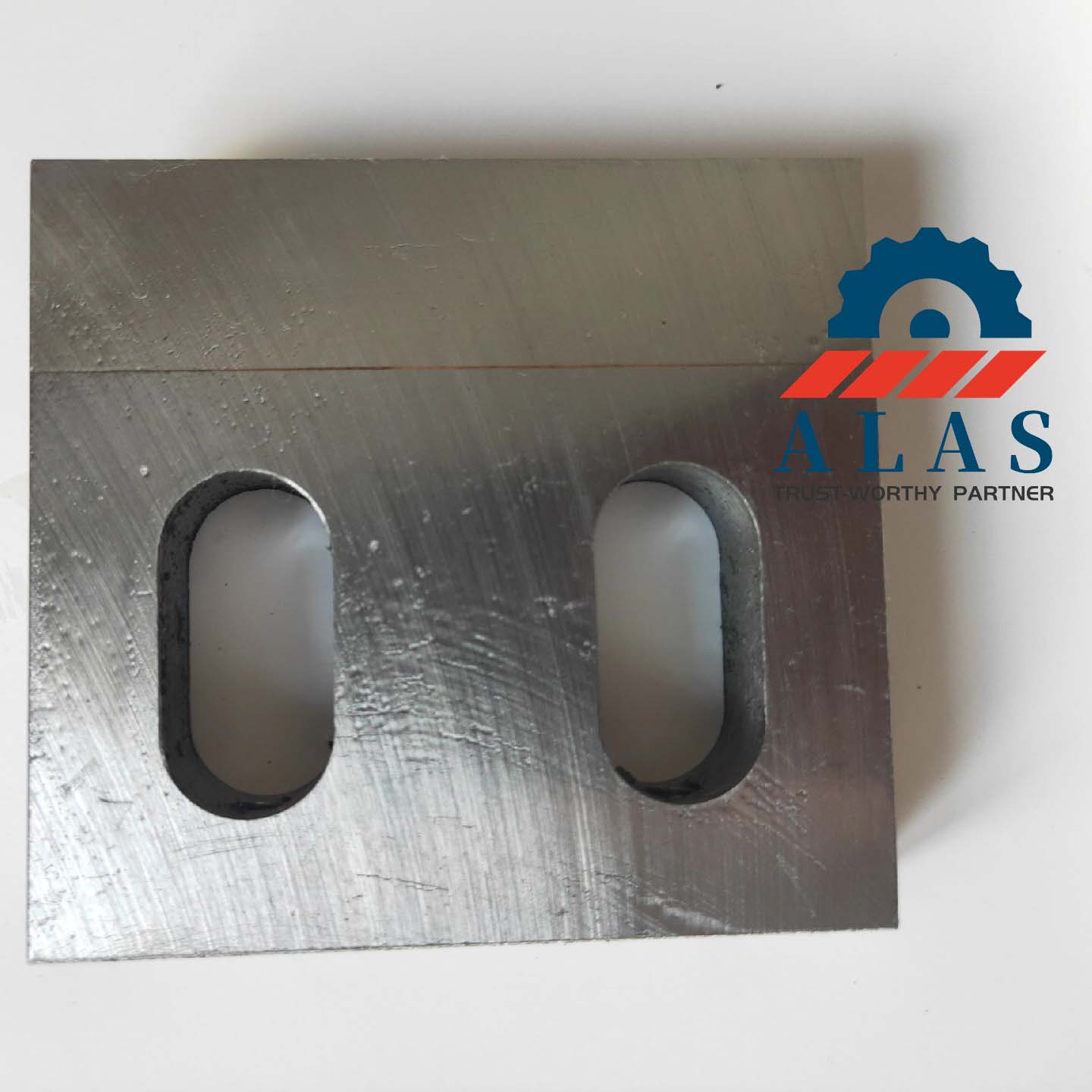 Front view of a custom inlaid HSS flat shredder blade with a visible welding joint line and mounting slots.