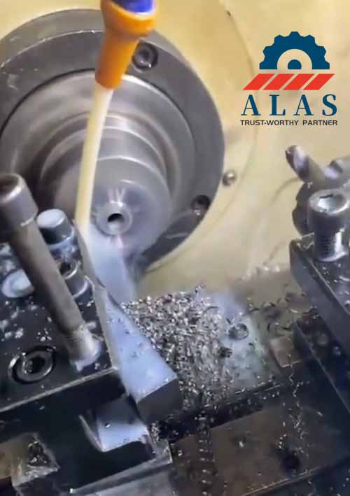 ALAS CNC high-precision machining cells processing exact counterbore depths and thread slots on tool steel shredder blocks.