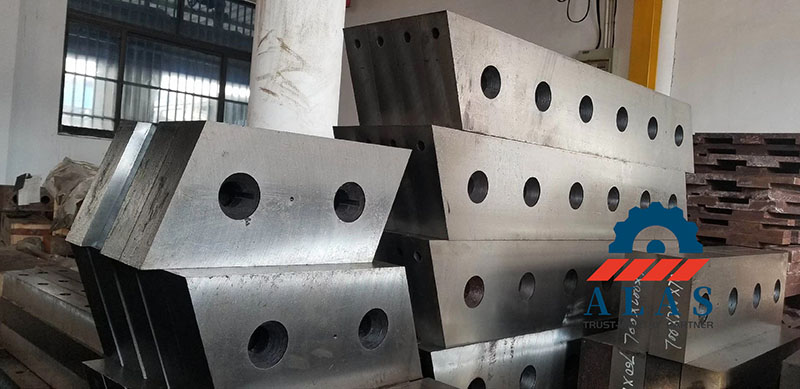 Batch stack of heavy-duty H13 and LD tool steel alligator shear blades after vacuum heat treatment