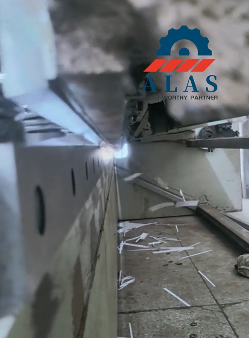Side profile view of upper and lower metal shear replacement blades in overlapping bypass position