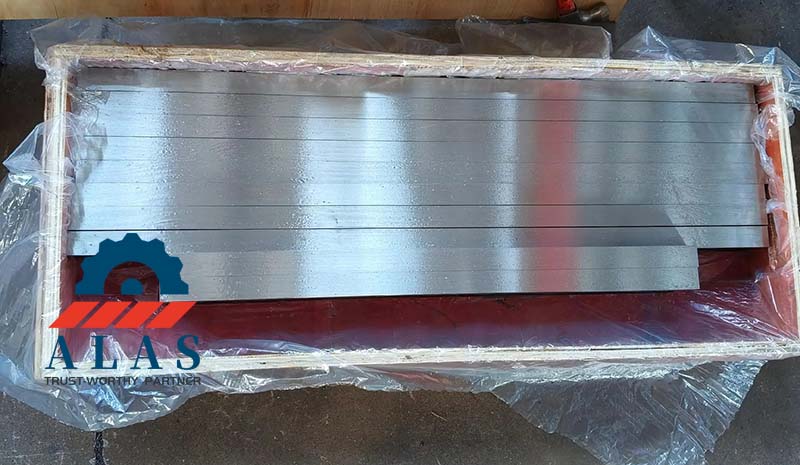 Heavy metal shear blades coated with rust-preventative oil and sealed in VCI vapor-barrier protective film.