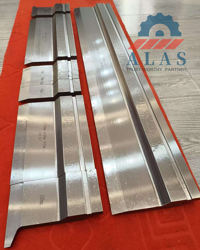 A complete turnkey precision segmented press brake punch and die set including 100mm side horn segments with a ground finish