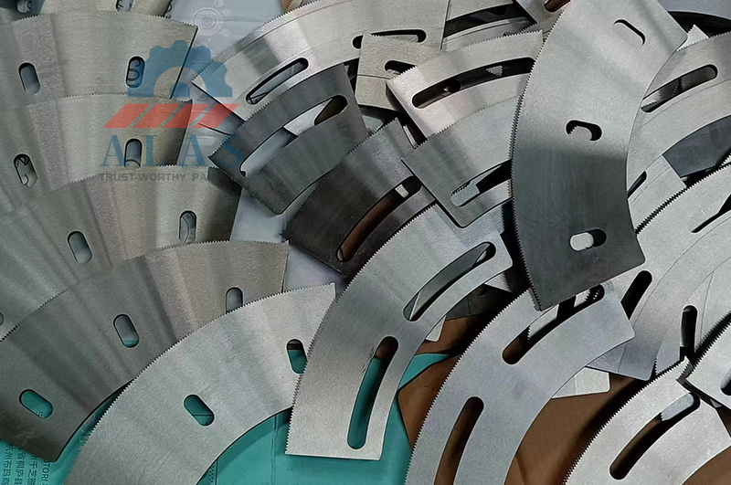 Batch inventory of precision-ground curved guillotine blades with mounting slots by ALAS