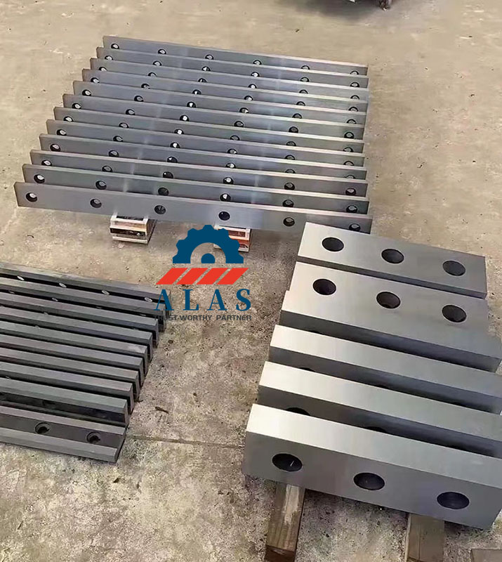 Bulk inventory of OEM standard replacement hydraulic scrap metal shear blades in various lengths and specifications