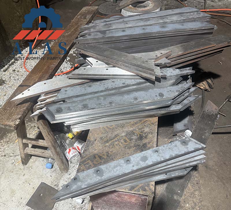 custom machined jumbo bag unloading blades workshop