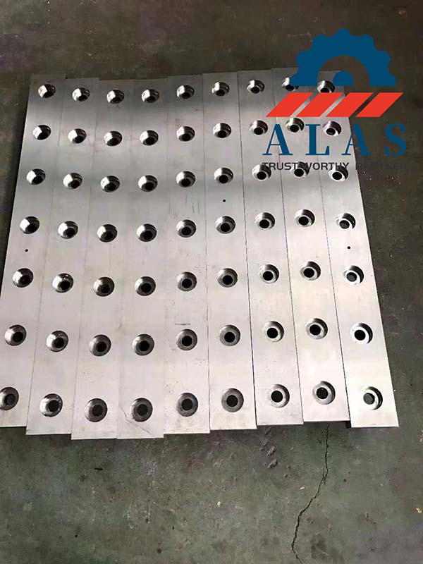 Precision-ground counterbored wear resistant shear blocks calibrated to tight thickness tolerances