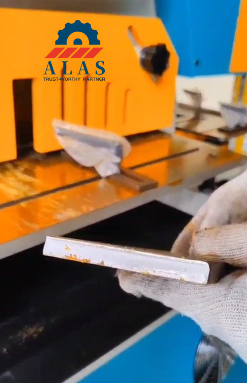 ALAS hydraulic ironworker shearing result showing smooth cut surface without burrs
