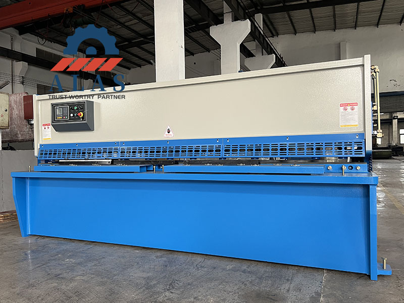 Brand new NC swing beam plate shear machine finished in blue and grey