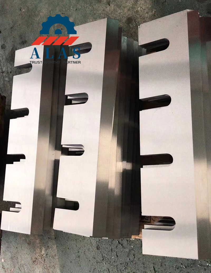 Industrial Wood Chipper Blades Replacement | ALAS Heavy duty drum wood chipper blades and industrial shredder knives stacked in Nanjing ALAS factory