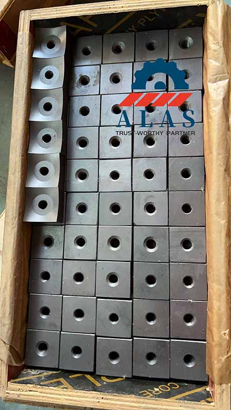 Through-hardened square concave single-shaft shredder blade inserts packed in wooden cases for secure wholesale shipping.