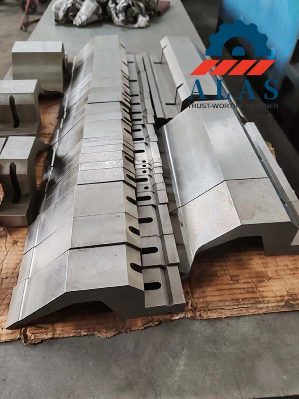 ALAS precision ground segmented euro style gooseneck upper punches sorted on workshop platform