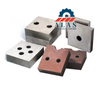 An assortment of custom bar cutter blades including vacuum-hardened H13 and D2 alloy 