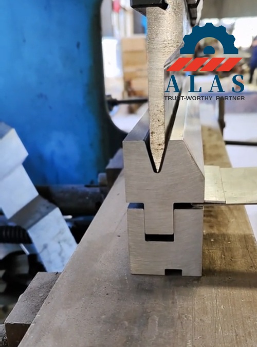 An active CNC press brake performing Step 2 edge flattening, compressing the pre-bent sheet metal flange into a 180-degree flat safe hem.