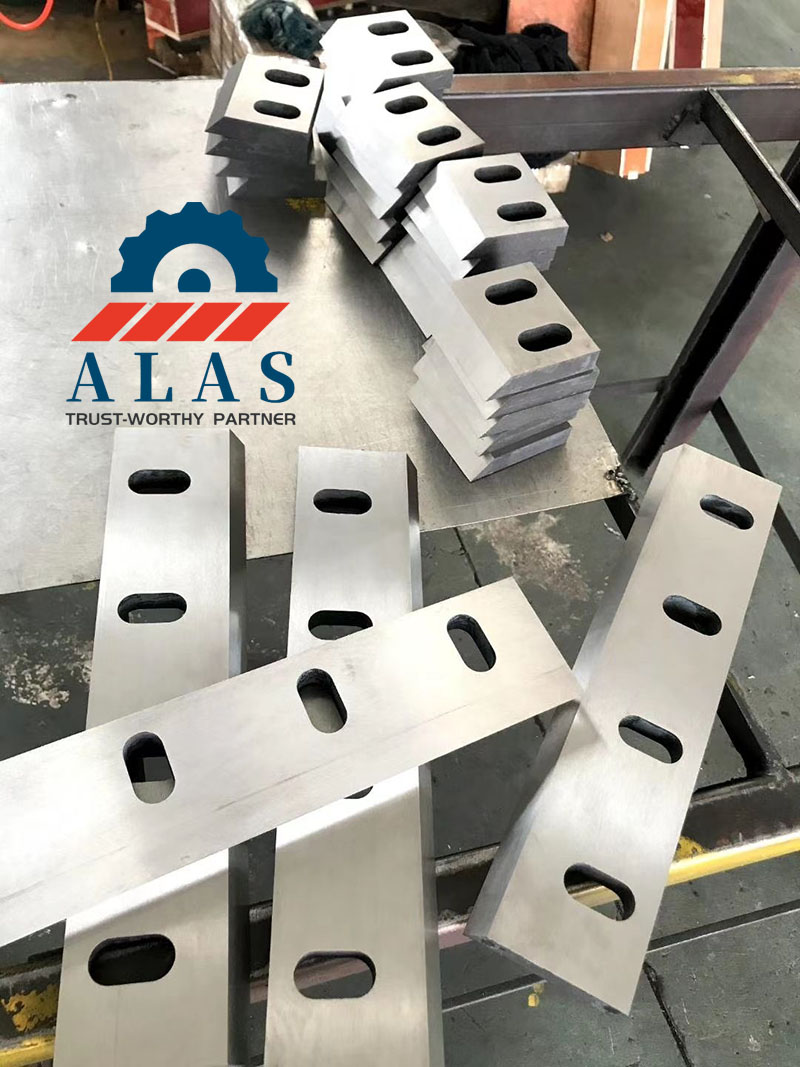 Custom length plastic shredder blades stock in manufacturing workshop