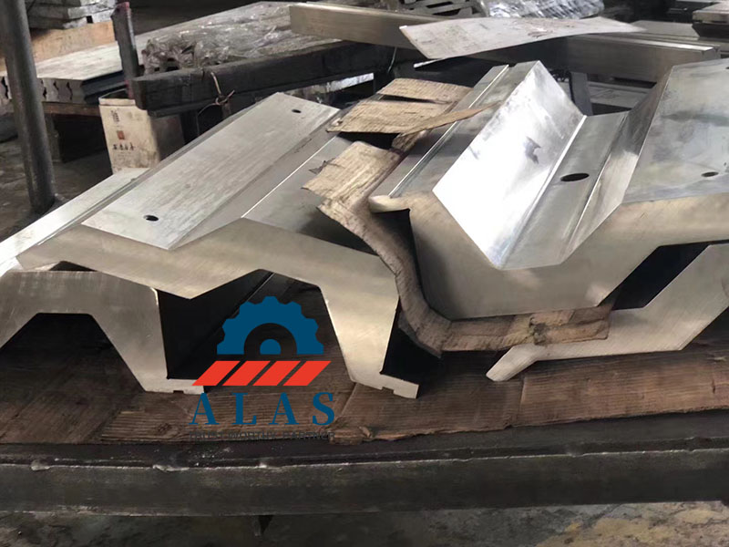 Custom industrial press brake dies featuring unique metal forming profiles
