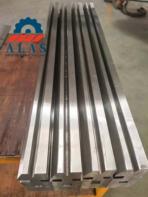 ALAS high-rigidity spring-loaded hemming die profiles showing precision ground pre-bend acute V grooves and flattening guide shoulders.