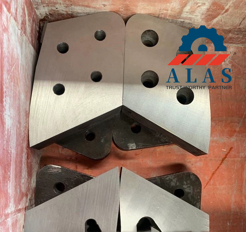 Vacuum quenched heavy-duty piercing tips and nose blades for structural iron shearing attachments.