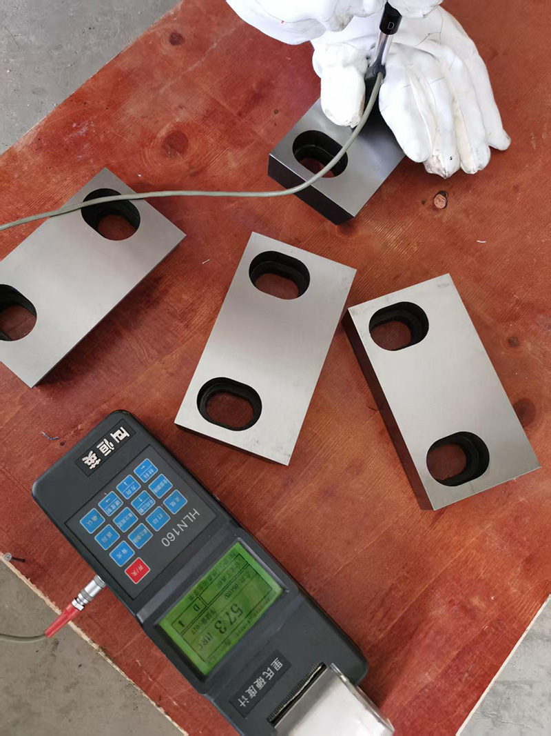 Rockwell hardness testing process ensuring uniform strength for cutting blades.
