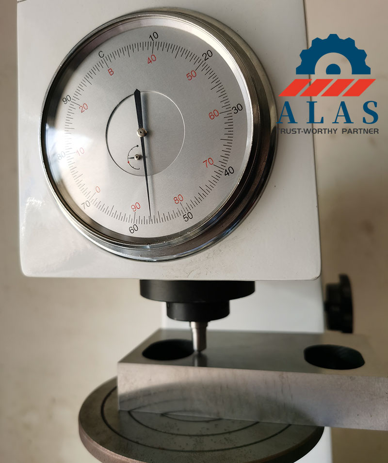 ALAS rebar cutter blade hardness test on a Rockwell tester showing 56.5 HRC
