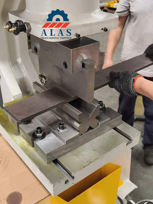 Heavy-duty ironworker press brake bending attachment block loaded with flat bar steel