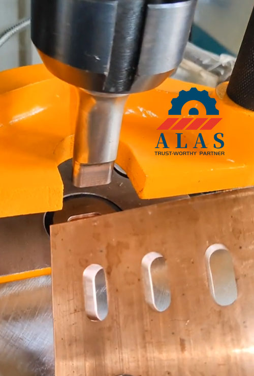 Burr-Free Perforation Quality with ALAS Ironworker Tooling Perfect burr free oblong slot holes punched on metal plate with ALAS precision dies