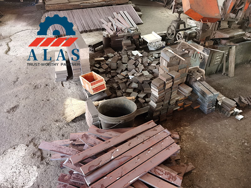 Raw steel bar sawing and blanking section in a rebar cutter blade manufacturing factory