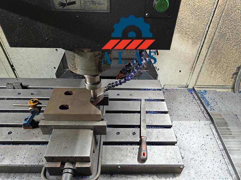CNC machine tool milling precise mounting profile and radius on a hot-work steel shear block