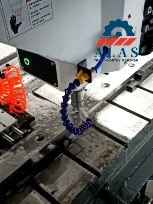 CNC surface grinding machinery processing special wear knives under continuous constant-flow coolant spray