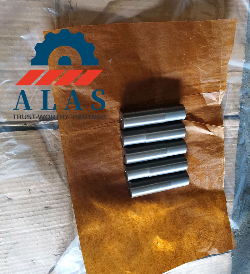 Precision ground 42CrMo steel rebar bender pin shafts placed on VCI anti-rust paper for export packaging