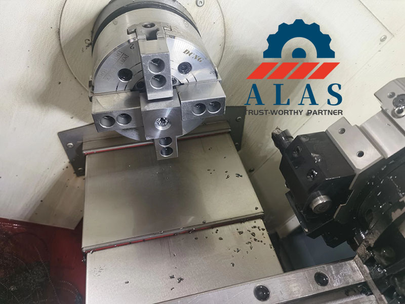 CNC lathe machine precision turning setup for DC53 tool steel shredder blades at Alas factory