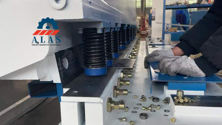 ALAS heavy-duty guillotine shear blade being installed on a hydraulic shearing machine for metal fabrication