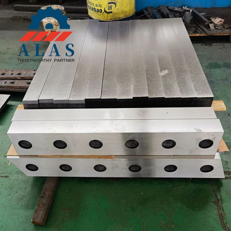 Long gantry shear blades and hydraulic guillotine metal shear blades in ALAS machinery workshop